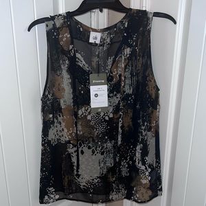 Cabi brand Incandescent Top.